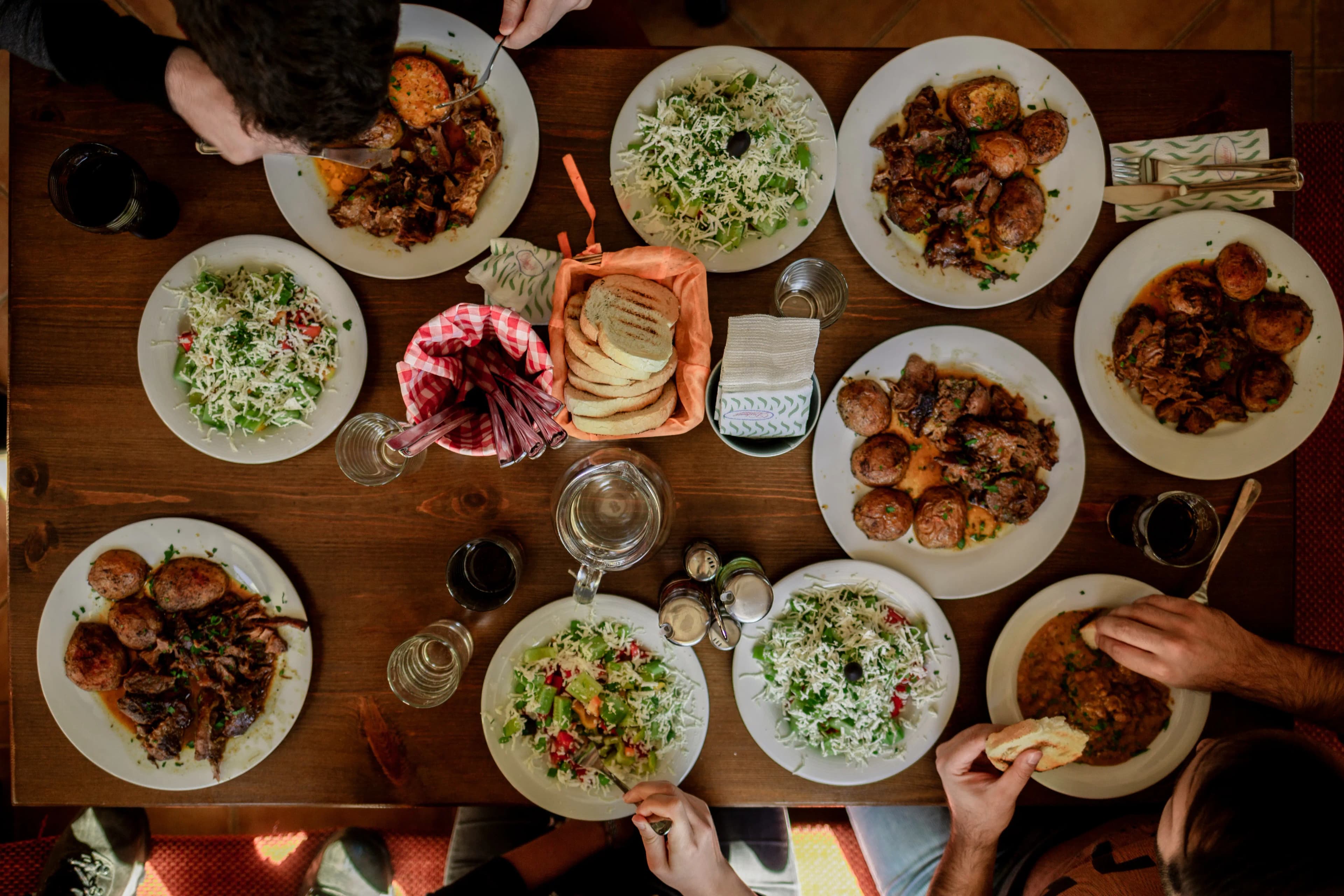 Family-style dinner spread, top-down