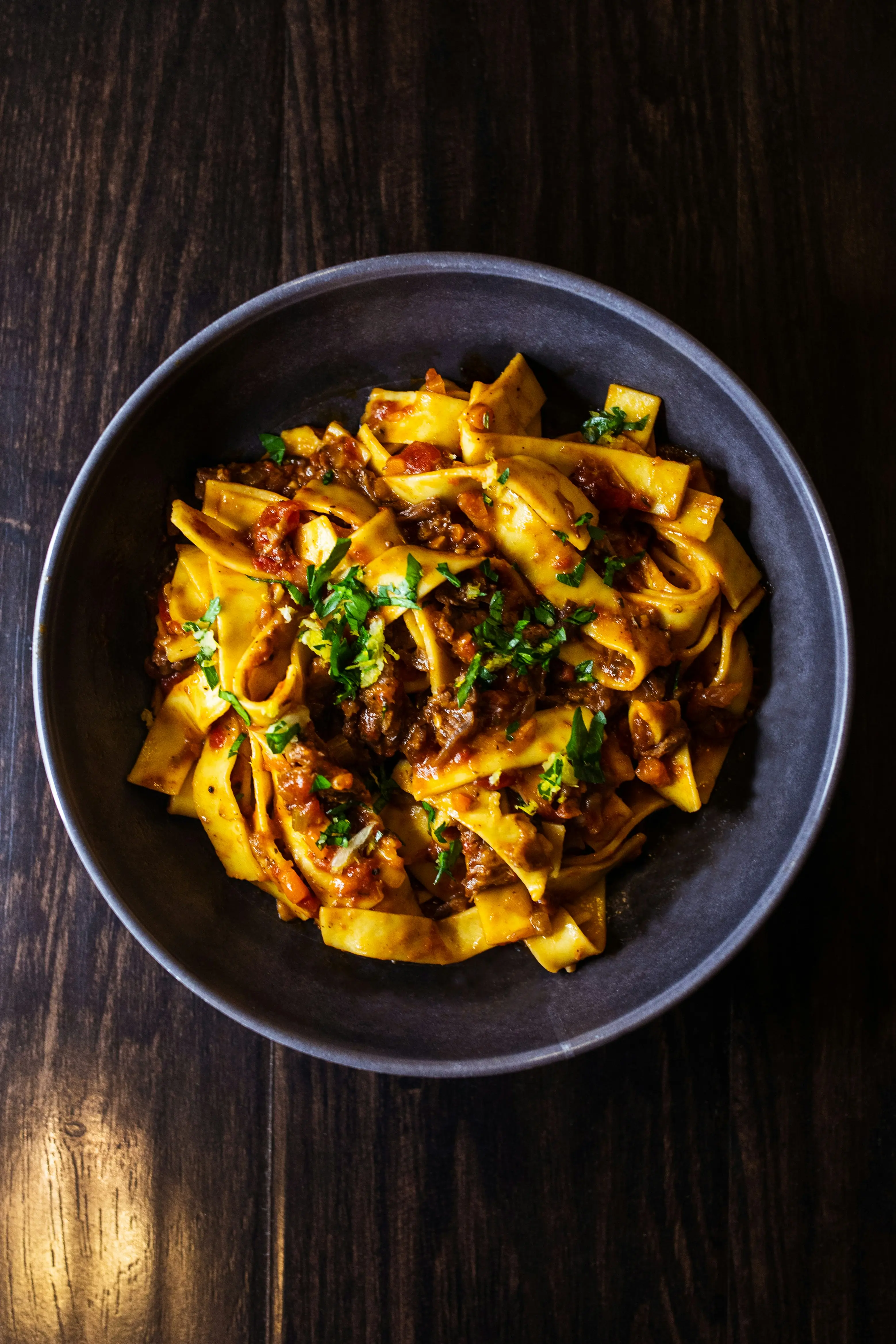 Pappardelle in a dark bowl